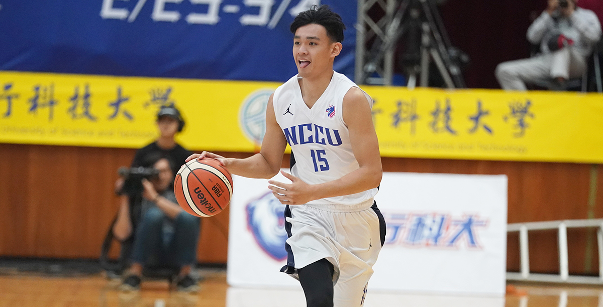政大張鎮衙關鍵切入,政大收下第二勝。攝/大專體總